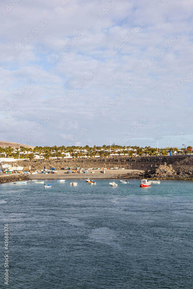 scenic view to the promenade of Playa Blanca, Lanzarote from sea