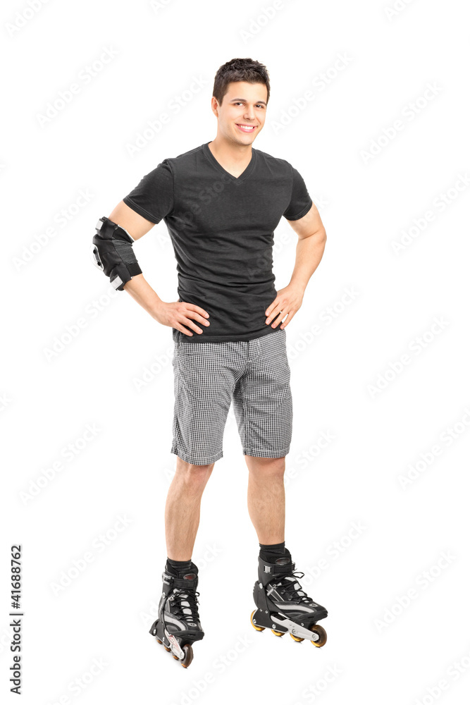 Full length portrait a male on rollers posing Full length portrait a male on rollers posing