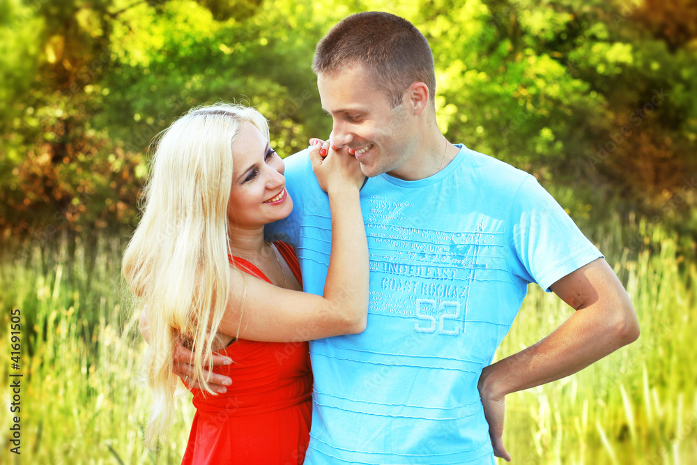 Closeup portrait of happy couple enjoying vacations on outdoors