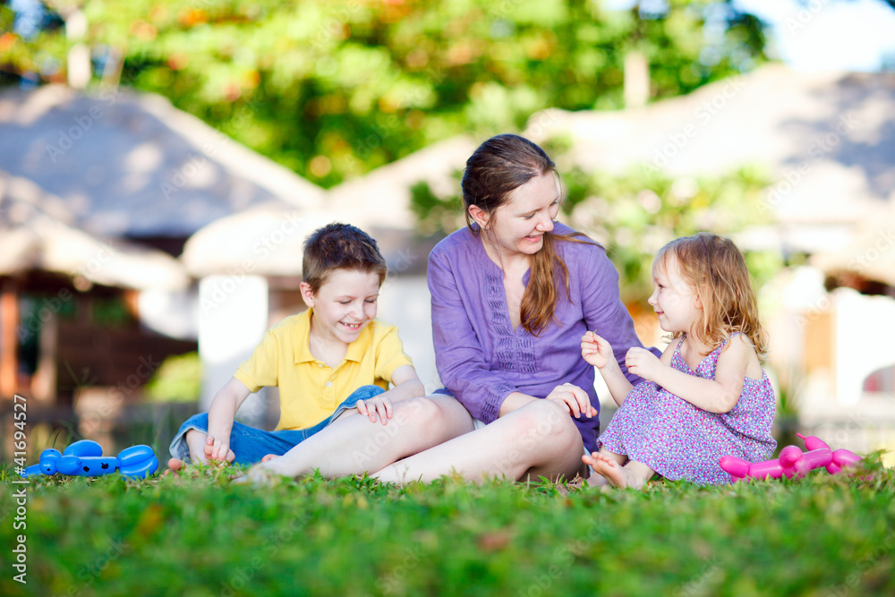 Fototapeta premium Mother and kids outdoors