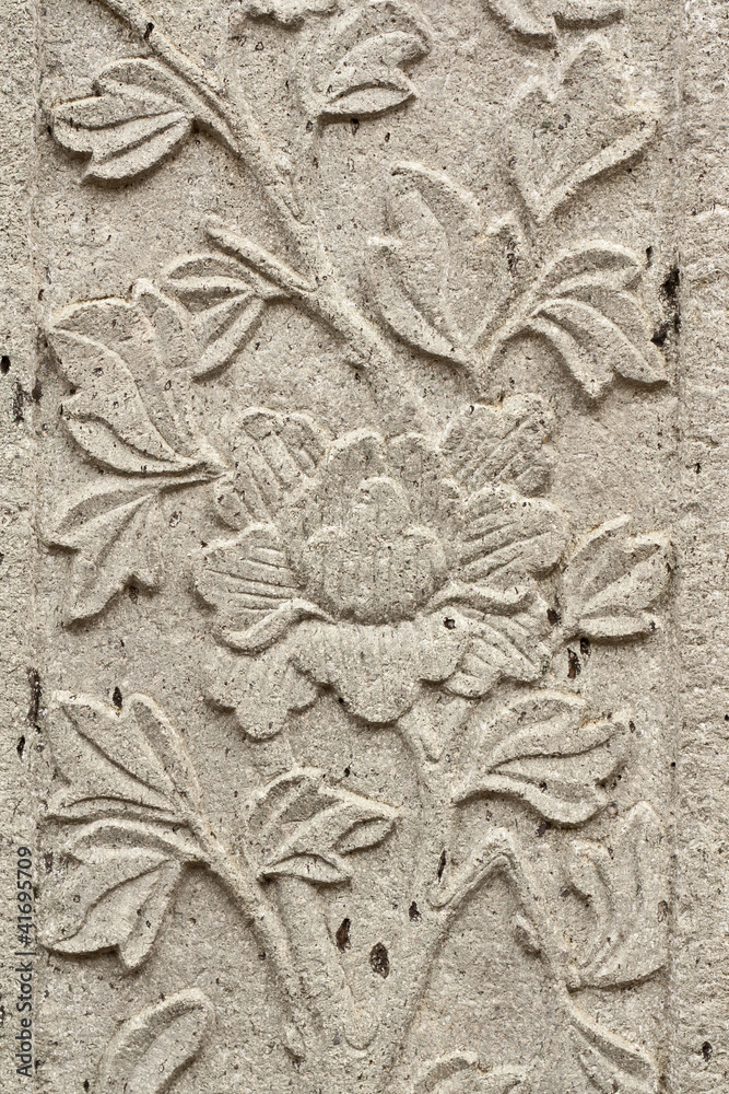 Stone carvings of flowers