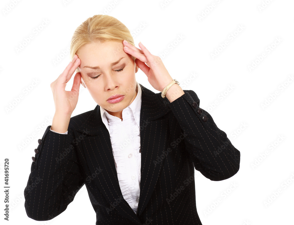 A businesswoman with a headache holding head A businesswoman with a headache holding head