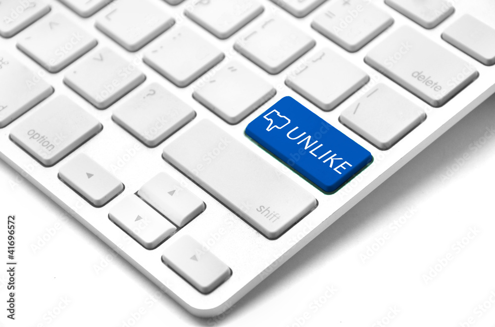 A keyboard with a blue key with the Thumb's unlike icon A keyboard with a blue key with the Thumb's unlike icon