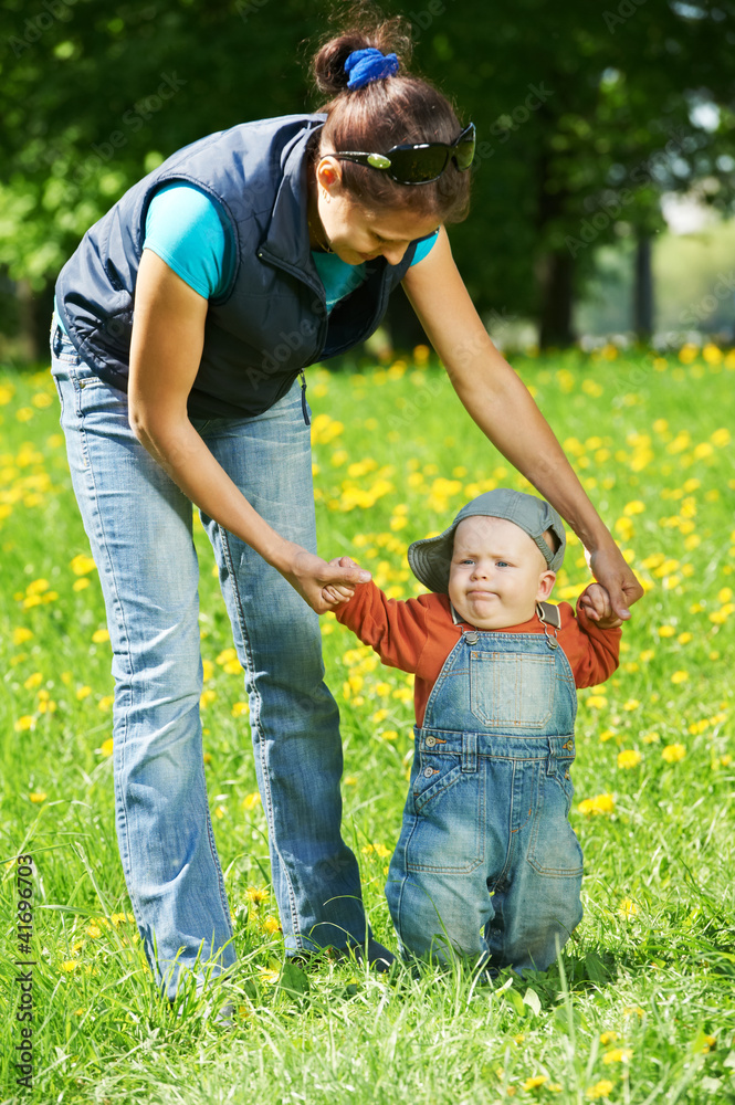 Fototapeta premium Mother playing with child boy
