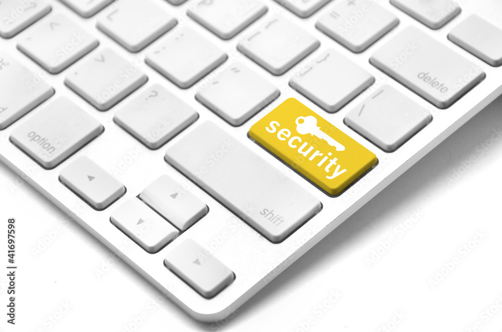 Keyboard with security button - computer security concept Keyboard with security button - computer security concept