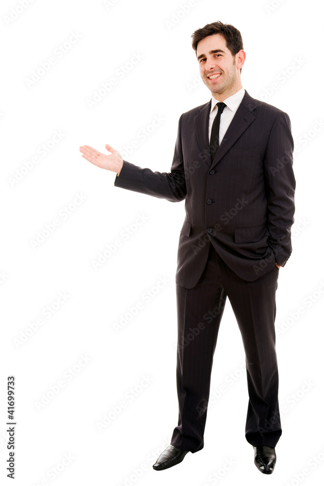 Full length of successful business man presenting over white bac Full length of successful business man presenting over white bac