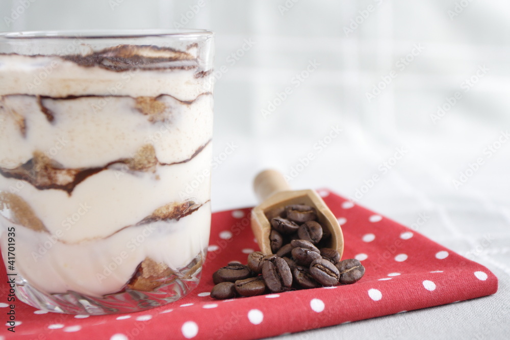 Obraz premium tiramisu on red napkin