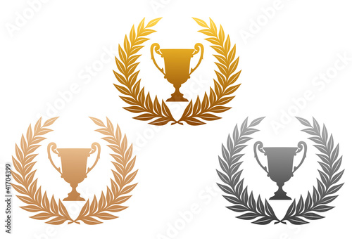 Golden, silver and bronze laurel wreaths with trophy