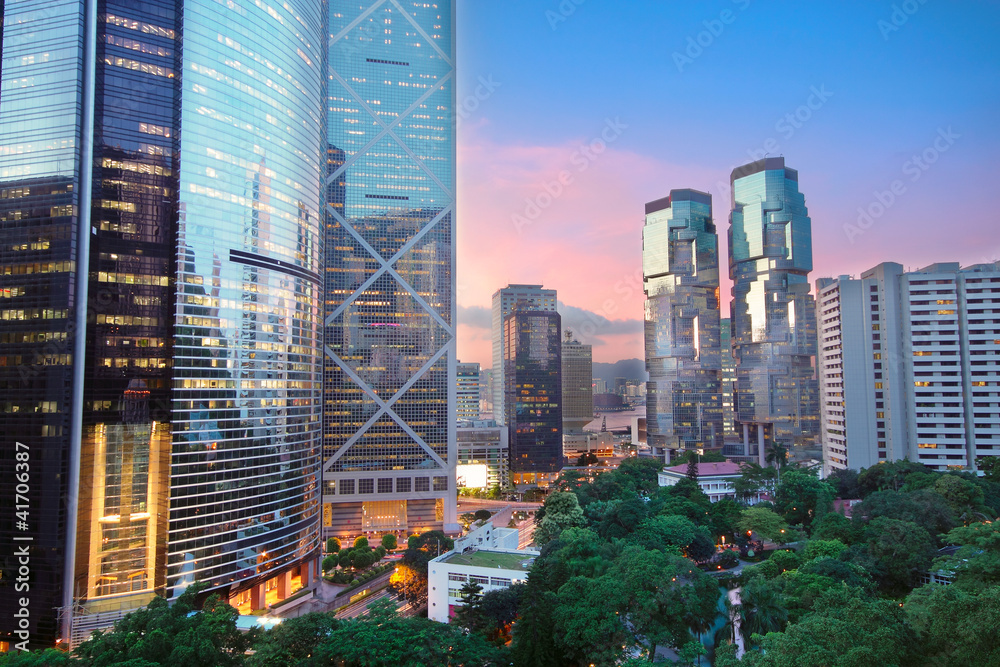 Obraz premium office building at night in hong kong