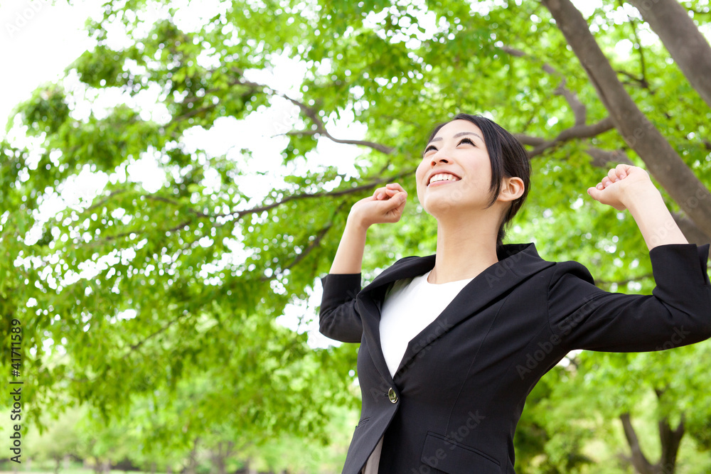 asian businesswoman relaxing in the park asian businesswoman relaxing in the park