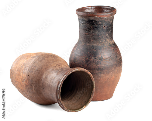 two ancient pitcher on a white background