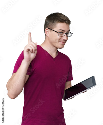 The handsome man with a tablet in hands photo