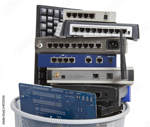 electronic scrap in trash can