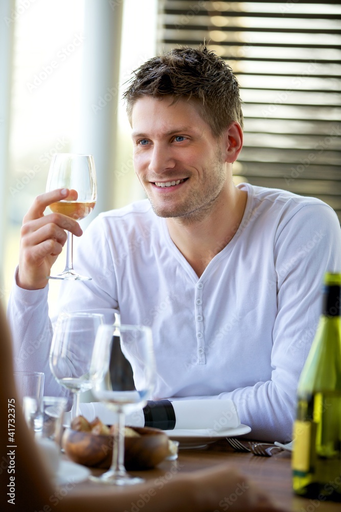 Handsome Guy Holding a Glass of Wine