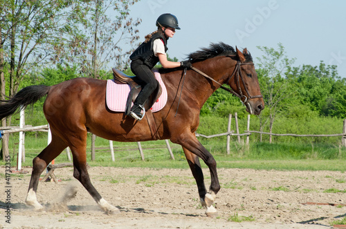 girl riding a horse
