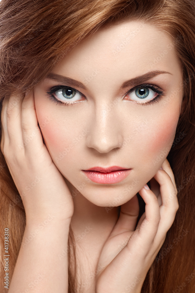 Close-up portrait of an attractive red-haired girl Close-up portrait of an attractive red-haired girl