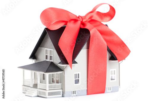 House architectural model with red bow