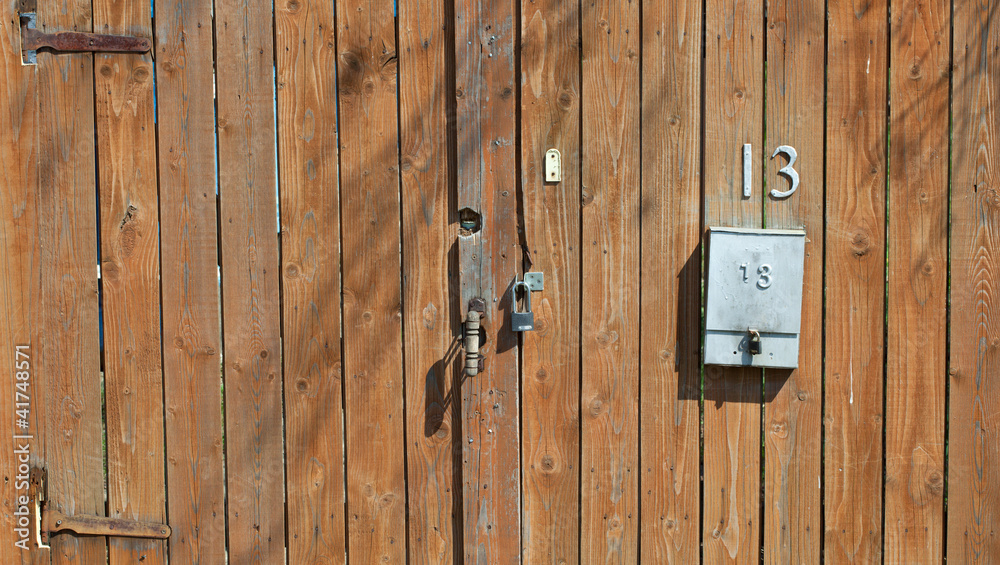 wooden fence with a mailbox wooden fence with a mailbox