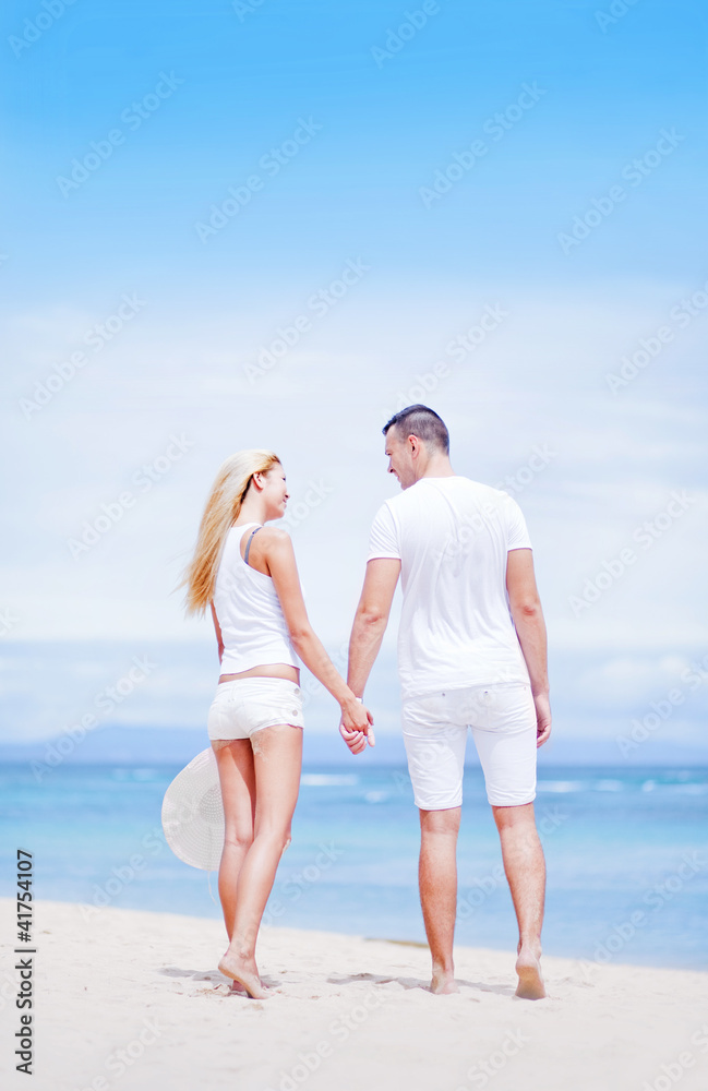 Young beautiful caucasian couple on the beach Young beautiful caucasian couple on the beach