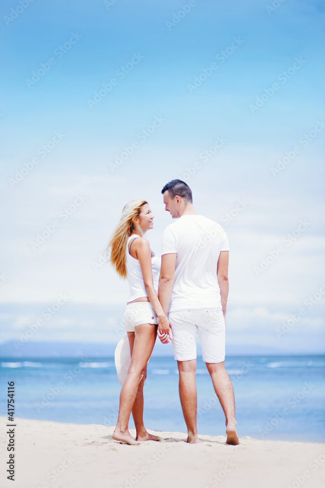 Young beautiful caucasian couple on the beach Young beautiful caucasian couple on the beach
