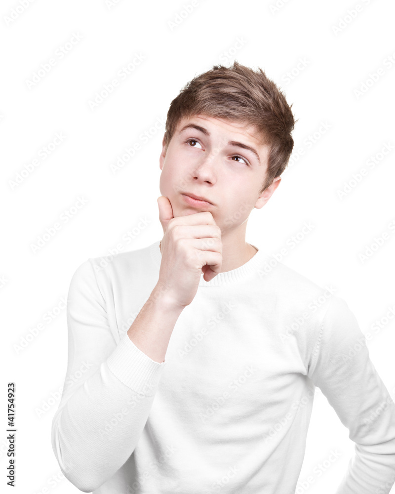 Pensive teenager in casual clothes isolated on white background Pensive teenager in casual clothes isolated on white background