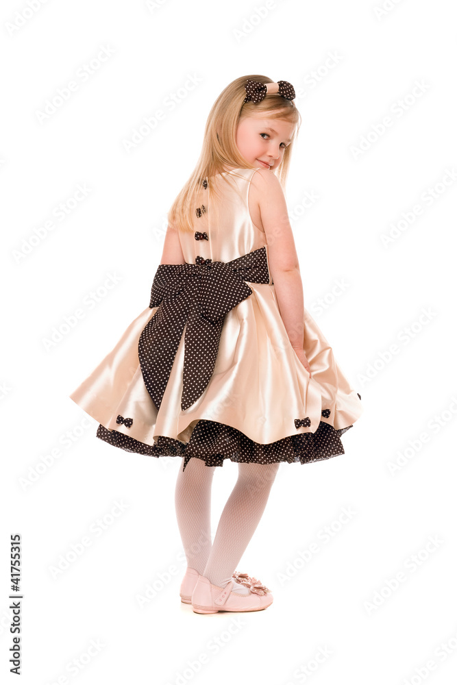 Naklejka premium Lovely little lady in a dress. Isolated