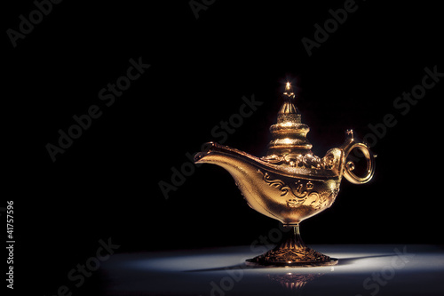 Magic Aladdin's Genie lamp on black