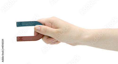 Magnet in a female hand.