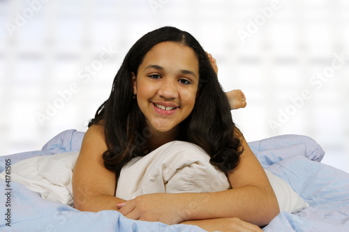 Teenager On Her Bed