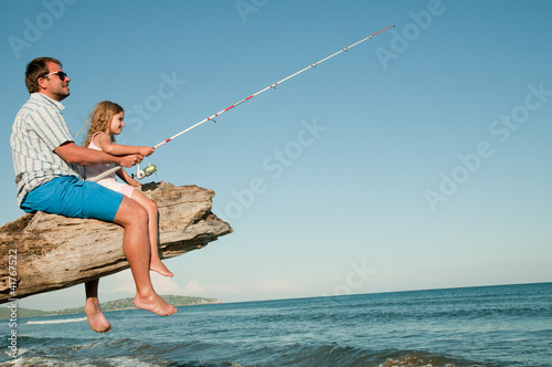 Summer beach, fishing team (copy space)