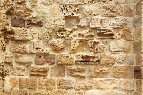 Medieval old stone wall