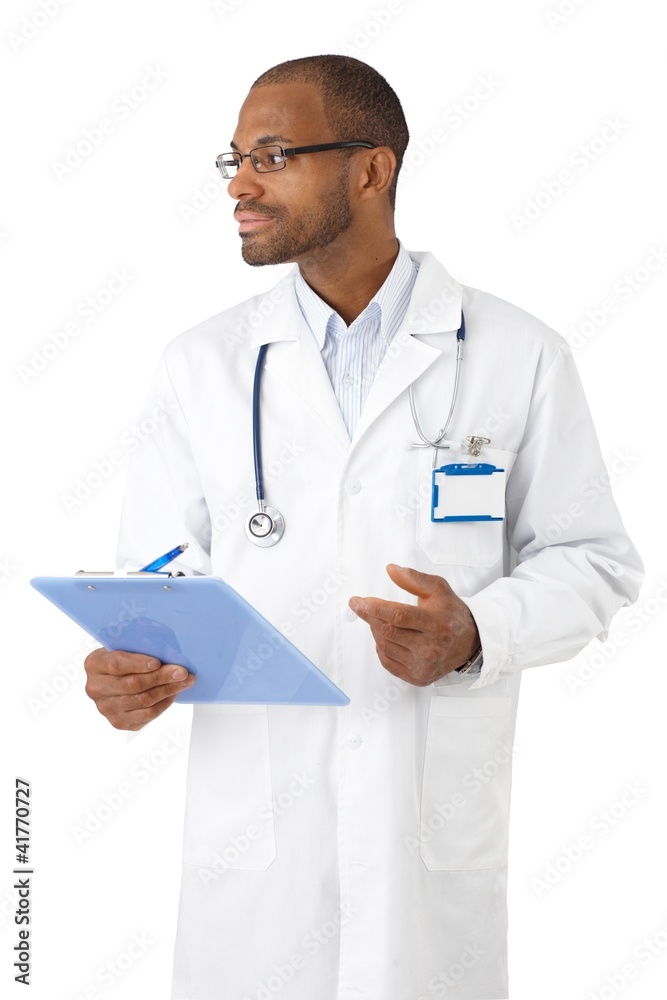 Doctor in uniform with clipboard Doctor in uniform with clipboard
