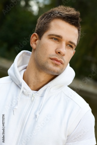 Portrait of young man outdoors