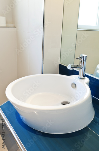 interior bathroom in modern house  sink and mirror