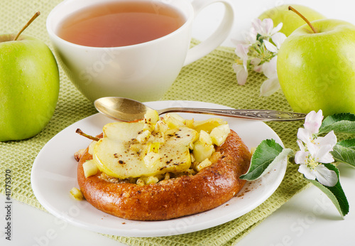 Apple cakes with tea cup