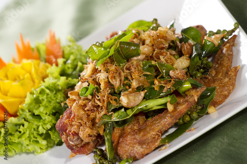 fried Chicken, fried chicken garnish with Thai herbs