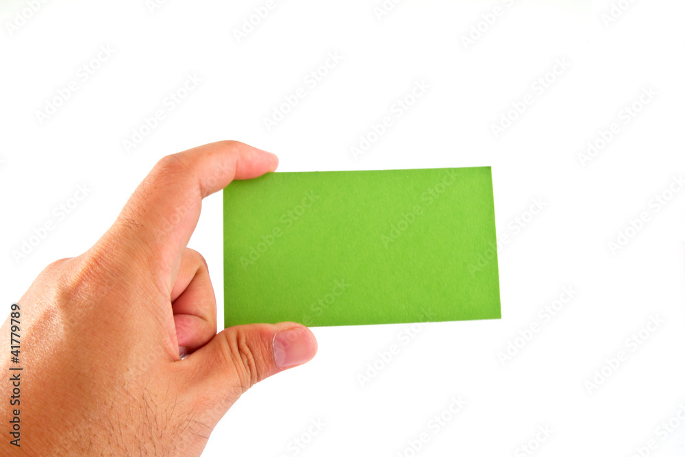 Paper green card in hand, isolated on white background Paper green card in hand, isolated on white background