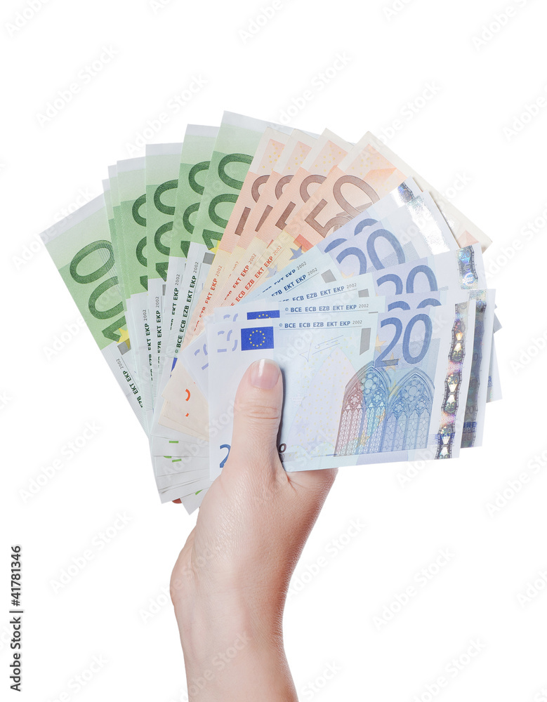 Euro banknotes in a hand isolated on white Euro banknotes in a hand isolated on white