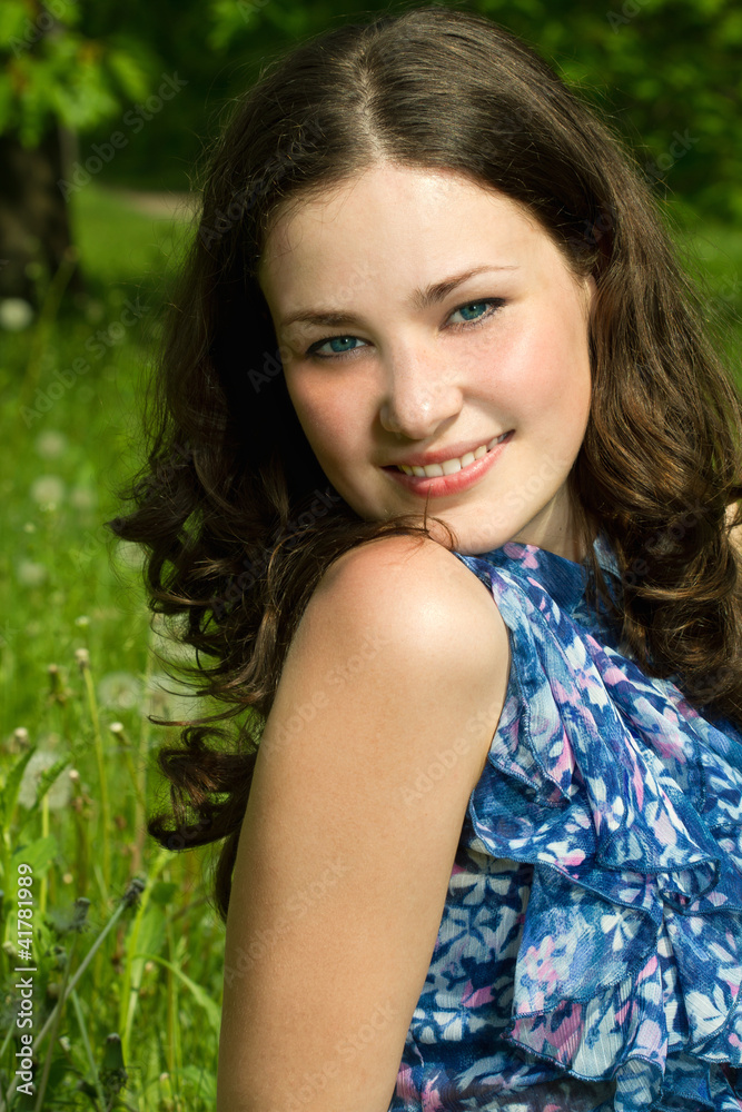 Beautiful young happy woman in spring