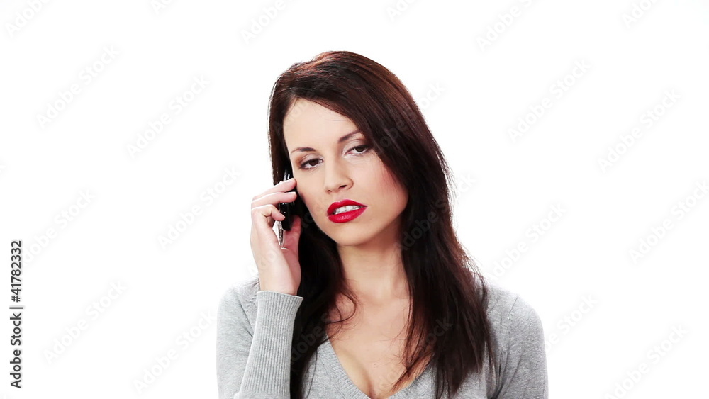Bad news. Beautiful woman talking on cellphone Bad news. Beautiful woman talking on cellphone