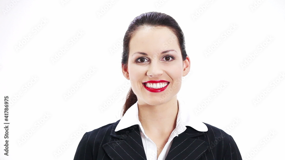 Businesswoman gesturing thumbs up. Over white background Businesswoman gesturing thumbs up. Over white background