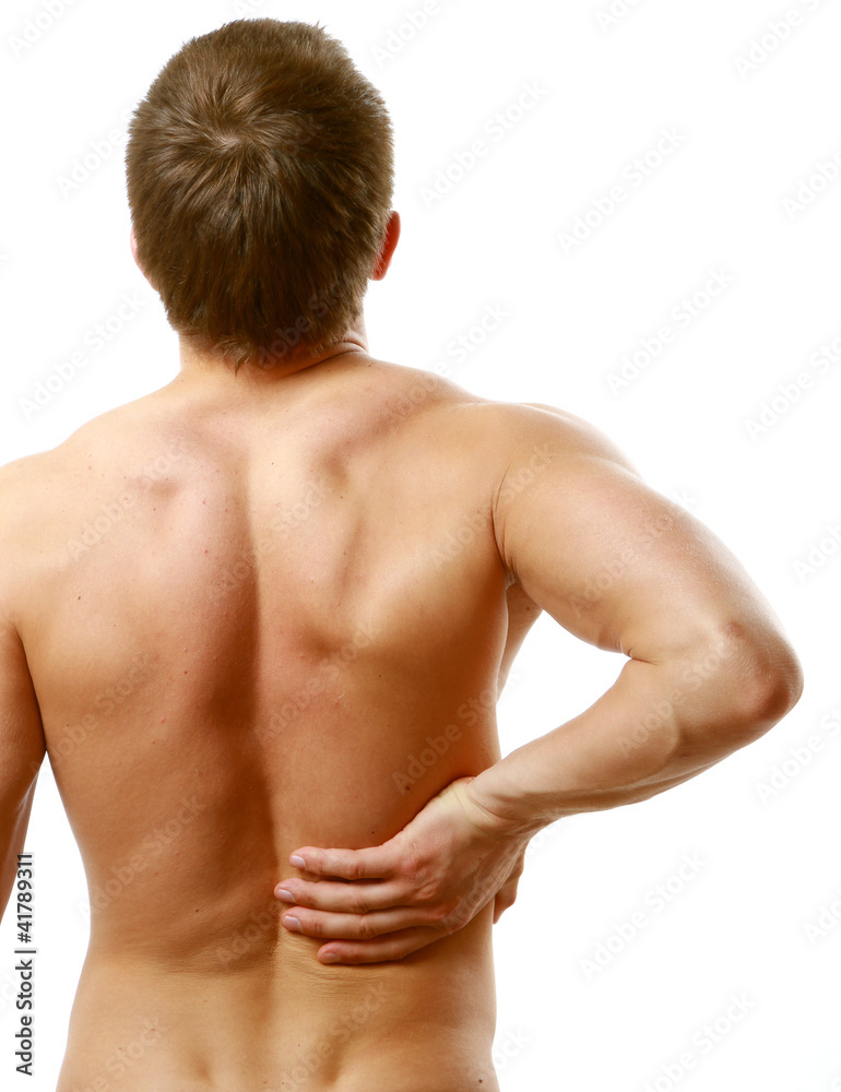 Young man with back pain.