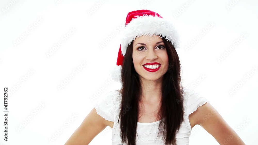 Christmas Girl.Winter woman gesturing thumbs up Christmas Girl.Winter woman gesturing thumbs up
