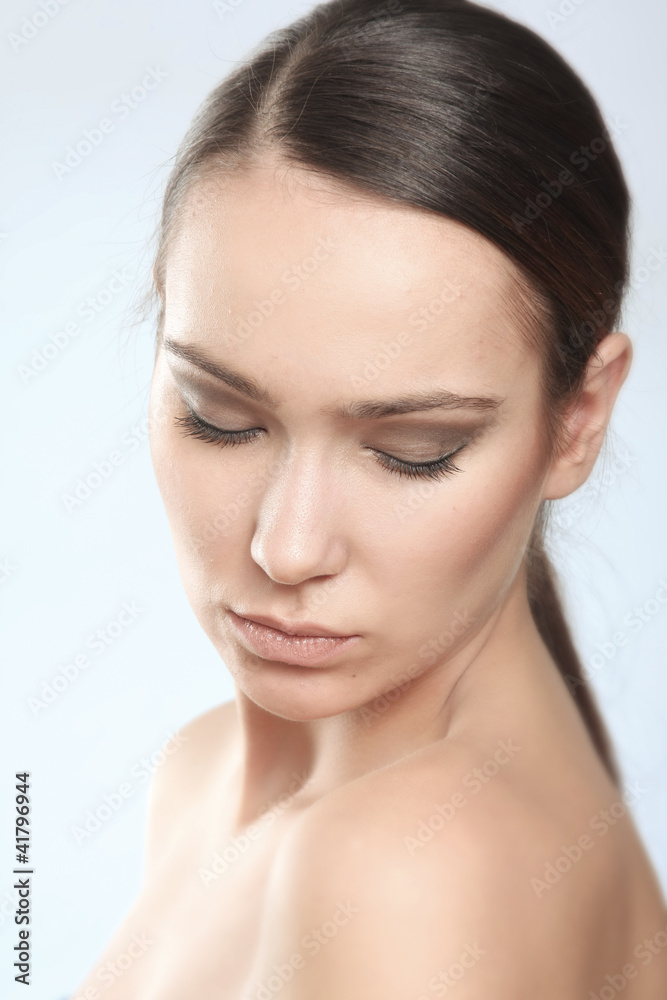 Beautiful young female face with a wellness complexion Beautiful young female face with a wellness complexion