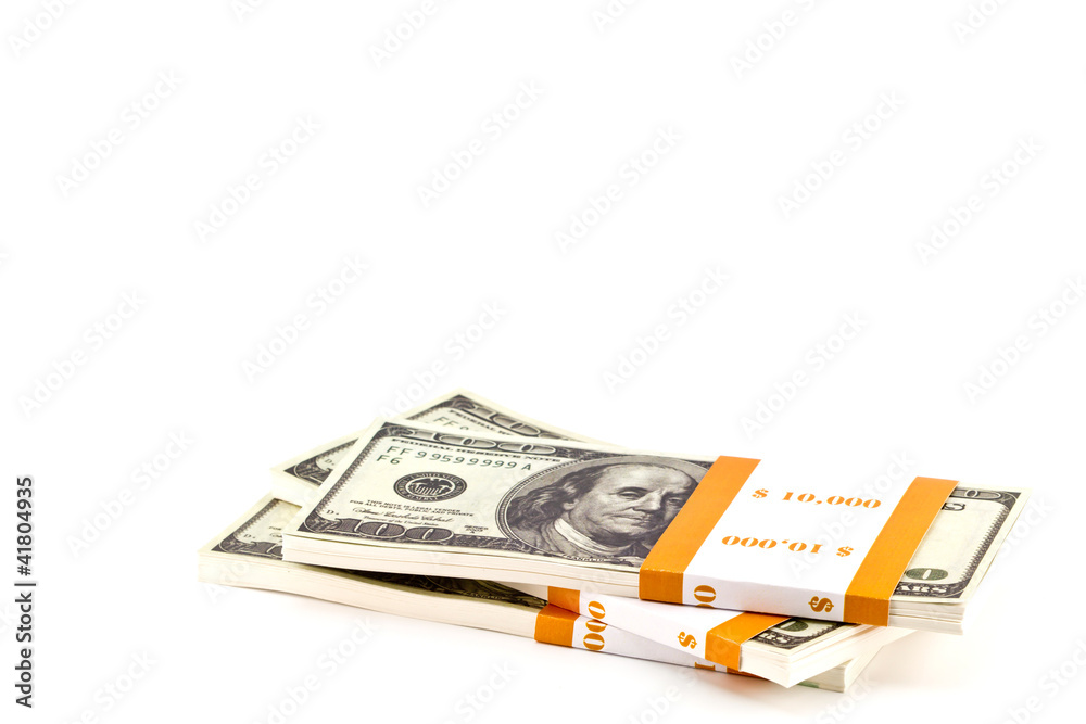 Ten thousand dollar stacks on the white Ten thousand dollar stacks on the white