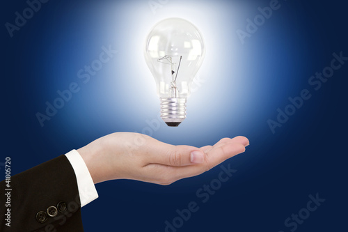 women hand with Light bulb