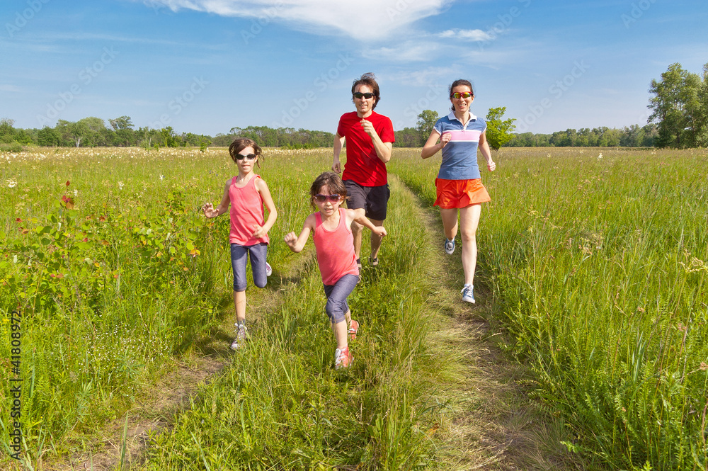 Family sport, jogging. Happy active parents with kids run Family sport, jogging. Happy active parents with kids run