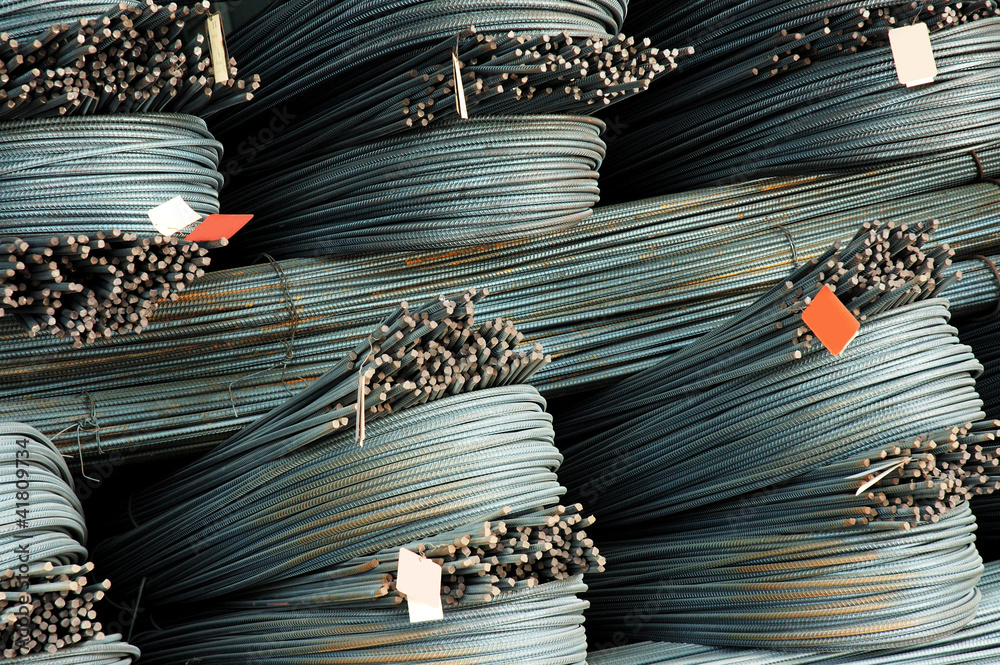 Steel rods or bars used to reinforce concrete, in warehouse