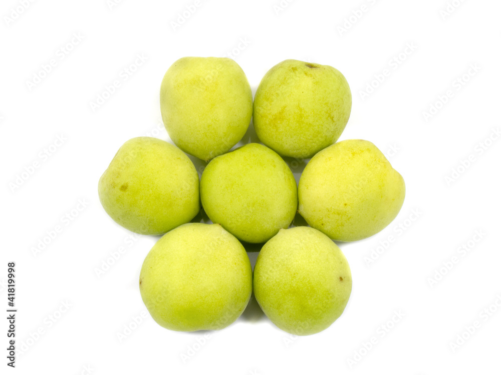 Fresh green plum in flower shape isolated Fresh green plum in flower shape isolated
