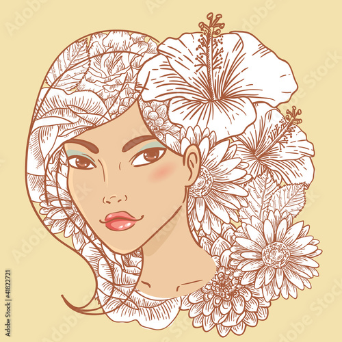 Attractive smiling young woman with floral hair